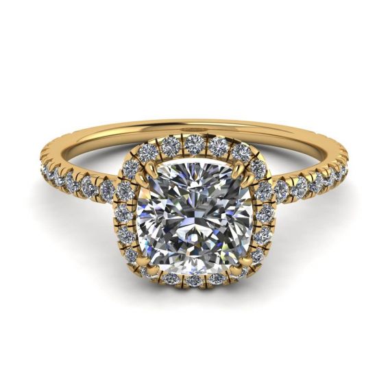 Anillo de compromiso con halo de diamantes de talla cojín en oro amarillo