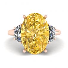 Diamante amarillo ovalado con media luna lateral Diamantes blancos Oro rosado