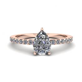 Anillo de pera con diamantes y pavé lateral en oro rosa