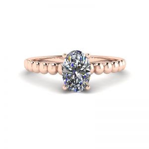 Diamante ovalado en anillo de oro rosado de 18 quilates con cuentas