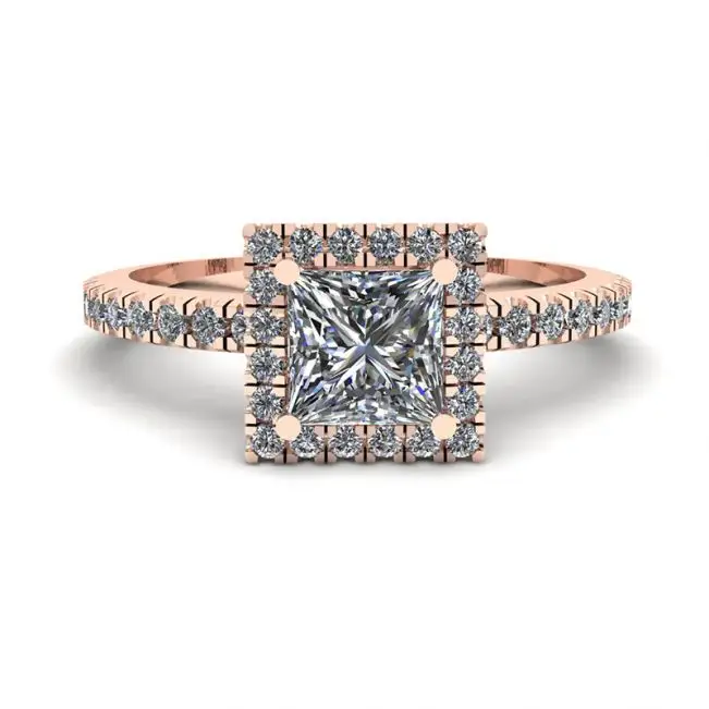 Anillo de compromiso con halo flotante de diamantes de talla princesa en oro rosado