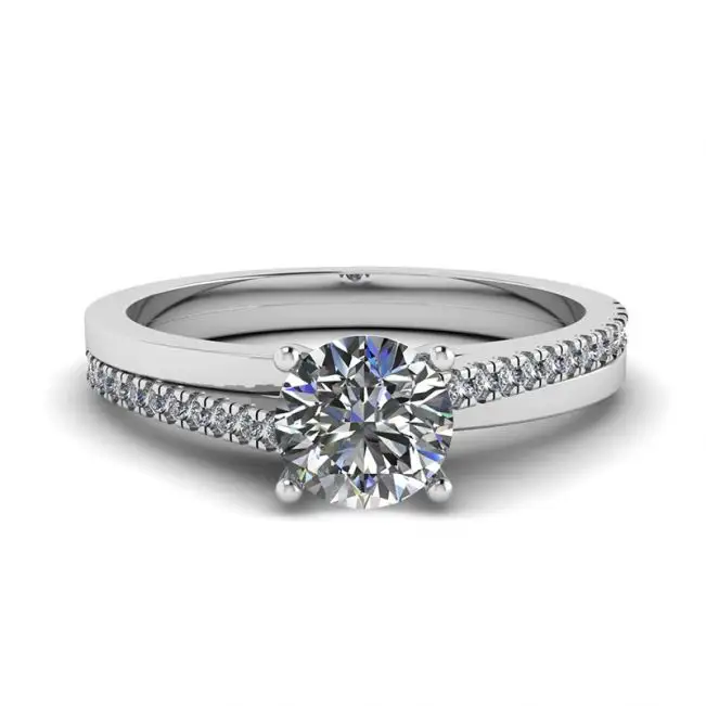 Anillo de compromiso con pavé lateral asimétrico en oro blanco