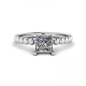 Anillo barbudo con diamante talla princesa