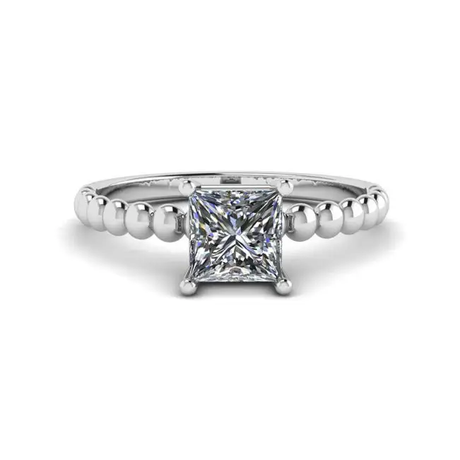 Anillo barbudo con diamante talla princesa