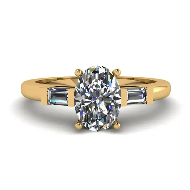 Anillo Baguettes Laterales con Diamantes Ovalados en Oro Amarillo