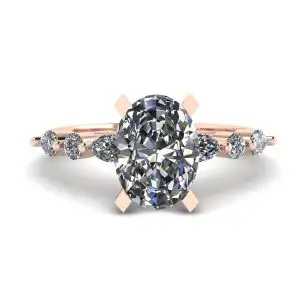 Anillo de piedras redondas y talla marquesa lateral con diamantes ovalados en oro rosa