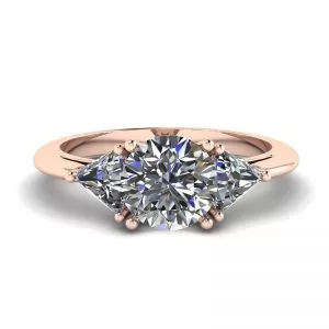 Anillo de tres diamantes en oro rosa de 18 quilates